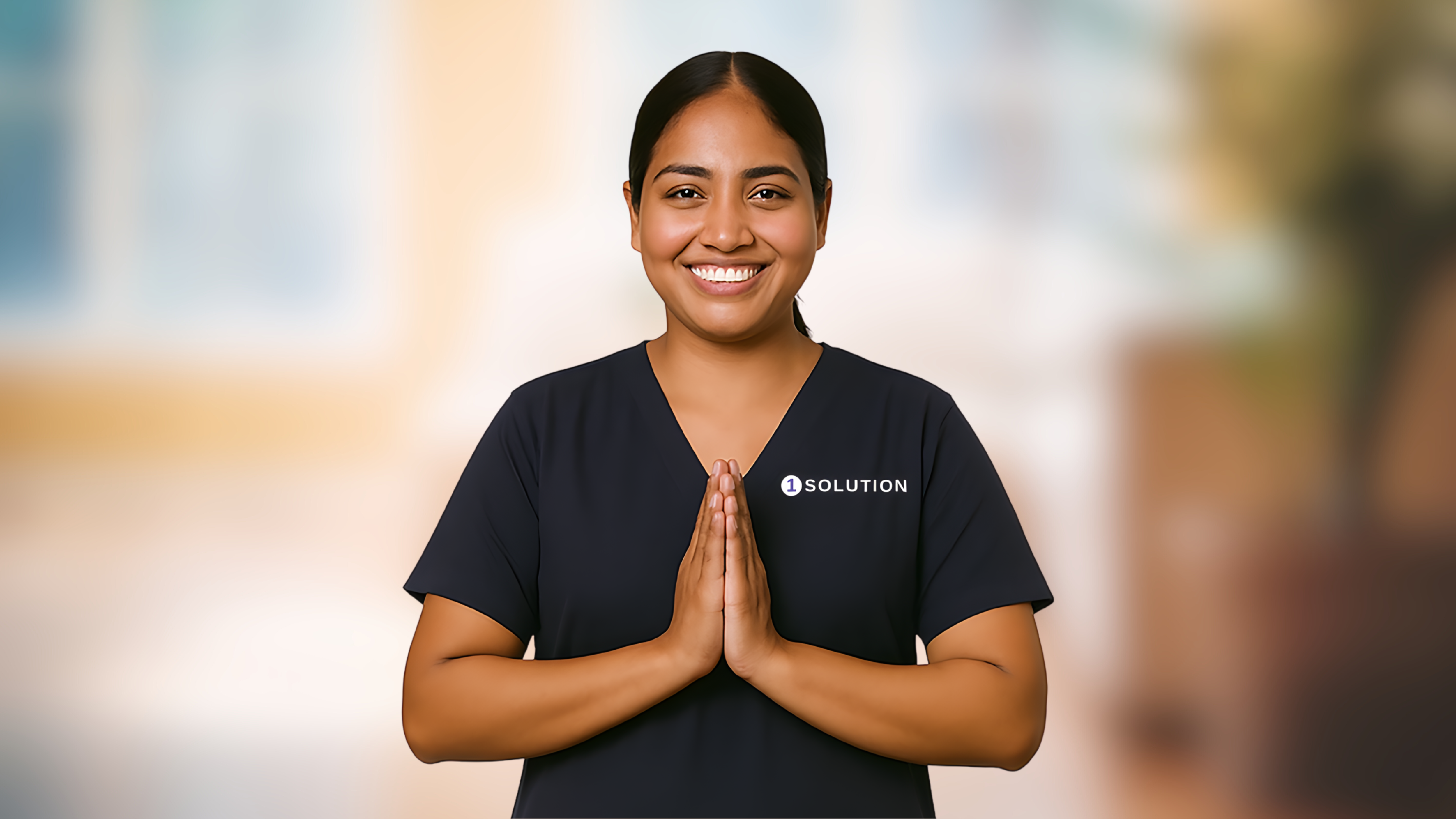 Worker smiling with folded hands